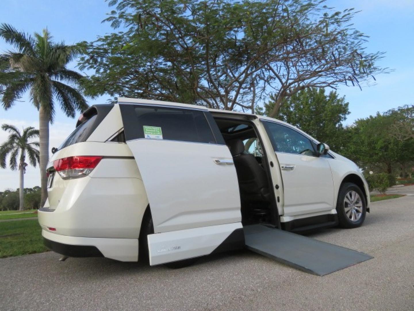 2016 White /Truffle Honda Odyssey (5FNRL5H63GB) , Automatic transmission, located at 4301 Oak Circle #19, Boca Raton, FL, 33431, (954) 561-2499, 26.388861, -80.084038 - You are looking at Gorgeous Pearl White Diamond 2016 Honda Odyssey EX-L VMI Northstar Handicap Wheelchair Conversion Van with 79K Original Miles, In-Floor Power Side Entry Ramp with Kneeling Van Function, Passenger Side 6 Way Transfer Seat, Quick Release Driver's Seat, Hand Controls, Tie Down System - Photo#49